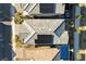 Aerial view of rooftops shows solar panels and pool with desert landscaping at 40 Strada Moscato, Henderson, NV 89011
