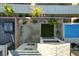 Aerial view of a backyard featuring a hot tub, artificial turf, desert landscaping, and swimming pool at 40 Strada Moscato, Henderson, NV 89011