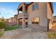 Spacious backyard with desert landscaping offers a private outdoor space at 40 Strada Moscato, Henderson, NV 89011