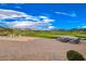 Inviting backyard patio featuring golf course views, ample seating, and a cozy fire pit at 40 Strada Moscato, Henderson, NV 89011
