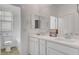Bright bathroom featuring a double vanity, modern fixtures, and a separate shower and toilet area at 40 Strada Moscato, Henderson, NV 89011