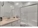 Bathroom featuring updated vanity and shower with glass doors at 40 Strada Moscato, Henderson, NV 89011