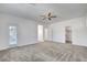 Spacious bedroom with ceiling fan, neutral carpet, and ample natural light at 40 Strada Moscato, Henderson, NV 89011