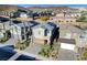 Modern two-story homes feature neutral palettes, brick driveways, and low-maintenance landscaping at 40 Strada Moscato, Henderson, NV 89011