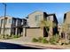 Well-maintained two-story home with a two-car garage, featuring a blend of modern design and desert flora at 40 Strada Moscato, Henderson, NV 89011