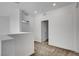 Bright upstairs hallway with neutral carpet and views to other areas at 40 Strada Moscato, Henderson, NV 89011