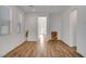 Bright and open living room with hardwood floors and large windows at 40 Strada Moscato, Henderson, NV 89011