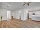 Open-concept living space with hardwood floors connecting to the kitchen at 40 Strada Moscato, Henderson, NV 89011