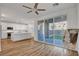 Open concept living and kitchen area with stainless steel appliances and quartz countertops at 40 Strada Moscato, Henderson, NV 89011