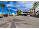 Paved parking area at Lake Las Vegas with palm trees, desert landscaping, and stone pillars at 40 Strada Moscato, Henderson, NV 89011