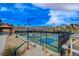 Several pickleball courts in a community setting, with palm trees and mountain views at 40 Strada Moscato, Henderson, NV 89011