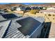 Solar panels on rooftop show energy efficiency of this neighborhood home at 40 Strada Moscato, Henderson, NV 89011