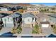 Three-car garages and desert landscaping enhance curb appeal of these new homes at 40 Strada Moscato, Henderson, NV 89011