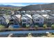 Rows of new construction homes feature desert landscaping and mountain views at 40 Strada Moscato, Henderson, NV 89011