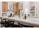 Bright kitchen featuring wood cabinets, stainless appliances, and a stylish marble countertop at 4065 Genoa Dr, Las Vegas, NV 89141
