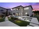 Backyard with a pool, spa, outdoor kitchen, covered patio, and a putting green at 4220 San Alivia Ct, Las Vegas, NV 89141