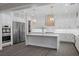 Bright kitchen with stainless steel appliances, granite countertops, and ample storage at 4220 San Alivia Ct, Las Vegas, NV 89141