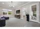 This living space is well appointed with a large TV, comfortable furniture, and easy access to other areas at 4220 San Alivia Ct, Las Vegas, NV 89141
