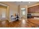 Spacious bonus room includes a wet bar, dining space, and desk, perfect for entertaining or home office at 4260 Helena Cove Ct, Las Vegas, NV 89129