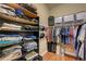 Walk-in closet offering ample storage space with shelves and hanging rods at 4260 Helena Cove Ct, Las Vegas, NV 89129