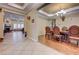 Spacious foyer with tile and hardwood floors, connecting the dining room to the open concept living area at 4260 Helena Cove Ct, Las Vegas, NV 89129