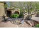 Charming single-story home with a stone facade, low maintenance landscaping, and a welcoming front entrance at 4260 Helena Cove Ct, Las Vegas, NV 89129