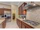 Modern kitchen featuring granite countertops, stainless steel appliances, and ample storage at 4260 Helena Cove Ct, Las Vegas, NV 89129