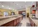 Expansive kitchen with granite countertops, custom cabinets, and stainless steel appliances at 4260 Helena Cove Ct, Las Vegas, NV 89129