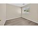 Bedroom showing neutral walls, wood floors and window at 4583 Sparwood Dr, Las Vegas, NV 89147