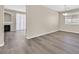 Open-concept living room featuring a fireplace and sliding glass doors at 4583 Sparwood Dr, Las Vegas, NV 89147