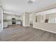 Open-concept living area with access to the kitchen and staircase at 4583 Sparwood Dr, Las Vegas, NV 89147
