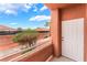 Private balcony with a view of the community landscape and nearby buildings at 4730 E Craig Rd # 1115, Las Vegas, NV 89115