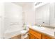 Clean bathroom featuring a bathtub, toilet, and vanity with a large mirror at 4730 E Craig Rd # 1115, Las Vegas, NV 89115