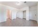 Bright bedroom featuring tile flooring, neutral walls, closet and bathroom entrances at 4730 E Craig Rd # 1115, Las Vegas, NV 89115