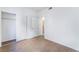 Bright bedroom featuring neutral walls, tile flooring and an adjacent closet at 4730 E Craig Rd # 1115, Las Vegas, NV 89115