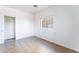 Bright room with neutral walls, tile flooring and a closet adjacent to a window at 4730 E Craig Rd # 1115, Las Vegas, NV 89115