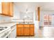 Open kitchen with light cabinets, a breakfast bar, and tile flooring; great for entertaining at 4730 E Craig Rd # 1115, Las Vegas, NV 89115