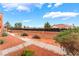 Community landscape featuring lush greenery and a view of surrounding neighborhood at 4730 E Craig Rd # 1115, Las Vegas, NV 89115