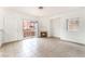 Bright living room with fireplace, sliding glass doors to the balcony, and tile flooring at 4730 E Craig Rd # 1115, Las Vegas, NV 89115