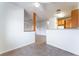 Open living area featuring tile floors and seamless transitions to the kitchen area at 4730 E Craig Rd # 1115, Las Vegas, NV 89115