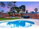 A stunning backyard featuring pool, a hot tub, and a cozy gazebo with fire pit at 4764 Lana Dr, Las Vegas, NV 89121