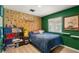 Whimsical bedroom with wood-look accent wall, decorative elements, and window at 4764 Lana Dr, Las Vegas, NV 89121
