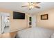Bedroom featuring hardwood floors, neutral paint, and a ceiling fan at 4764 Lana Dr, Las Vegas, NV 89121