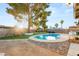 Beautiful backyard with a refreshing pool, gazebo, play area, and well-maintained landscaping at 4764 Lana Dr, Las Vegas, NV 89121
