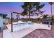 Backyard featuring a pool, bar with seating, mature trees, and a relaxing jacuzzi at 4764 Lana Dr, Las Vegas, NV 89121