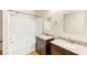 Bathroom features a double vanity with granite countertops, and shower-tub combination at 4830 Grey Wolf Ln # 104, Las Vegas, NV 89149