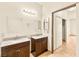 Bathroom featuring double vanity, granite countertops and tiled flooring at 4830 Grey Wolf Ln # 104, Las Vegas, NV 89149