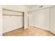 Bedroom with closet, neutral walls, and tile flooring throughout at 4830 Grey Wolf Ln # 104, Las Vegas, NV 89149