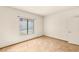 Sunlit bedroom with tiled flooring and a view of the home's exterior at 4830 Grey Wolf Ln # 104, Las Vegas, NV 89149