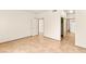 Spacious bedroom featuring tiled flooring and access to a private bathroom at 4830 Grey Wolf Ln # 104, Las Vegas, NV 89149